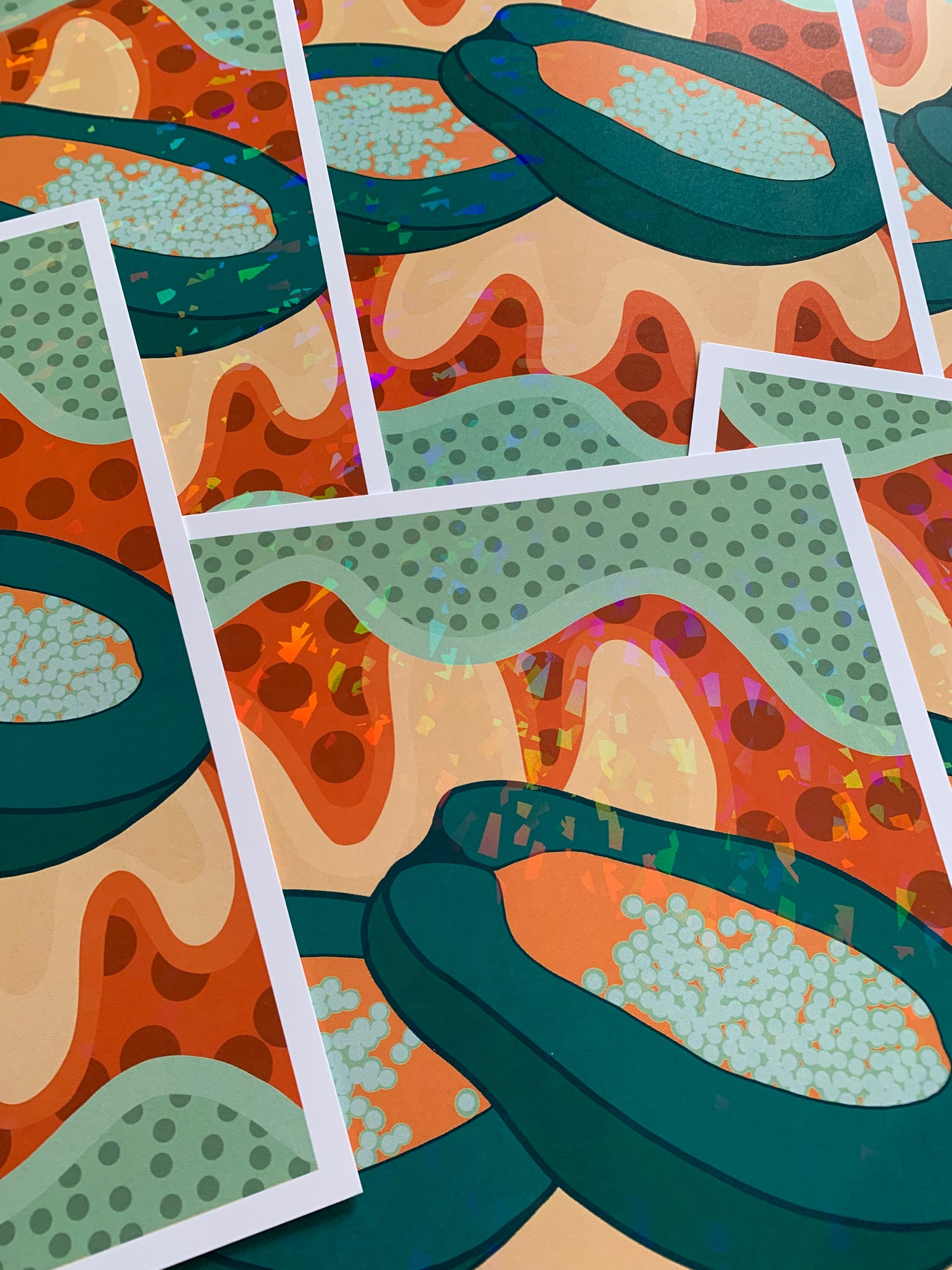 Detail photo of holographic papaya prints
