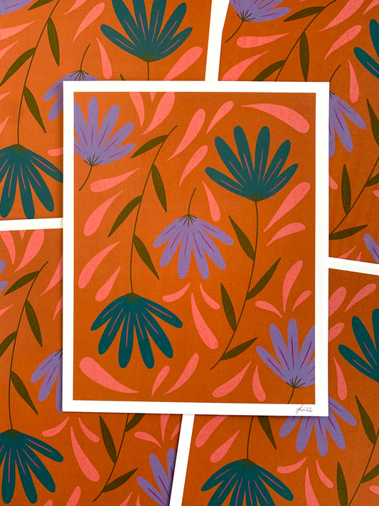 Spread of colorful flowers on orange background art prints