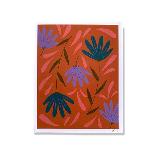 Colorful flowers on orange background against a white background