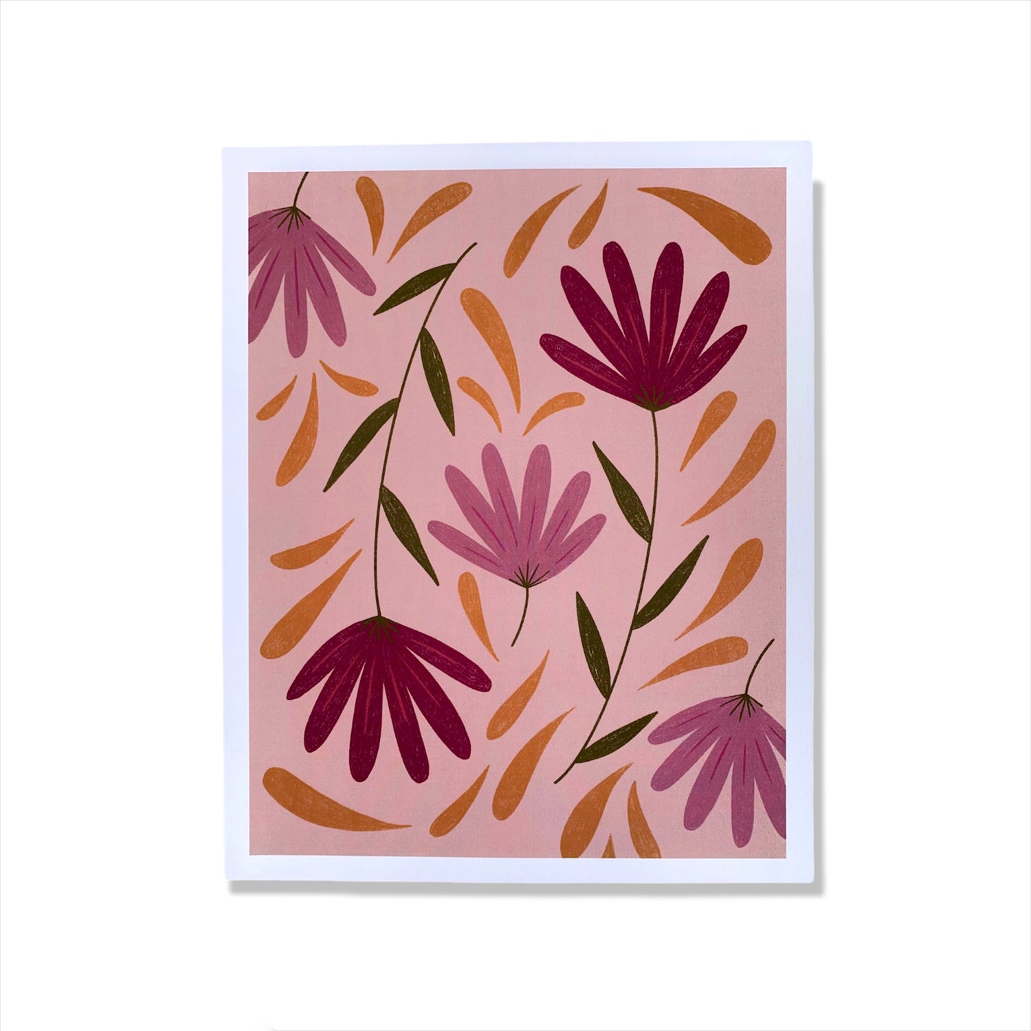 Colorful flowers on pink background against a white background